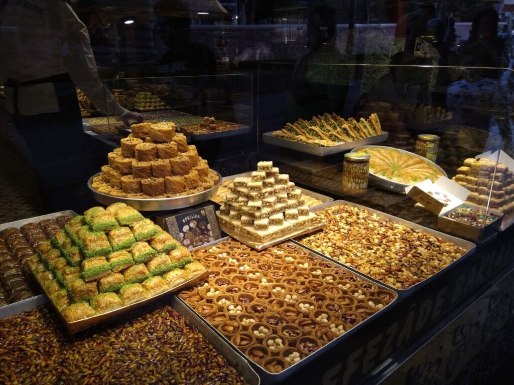 A vibrant display of traditional Turkish sweets in a confectionery shop in Istanbul.